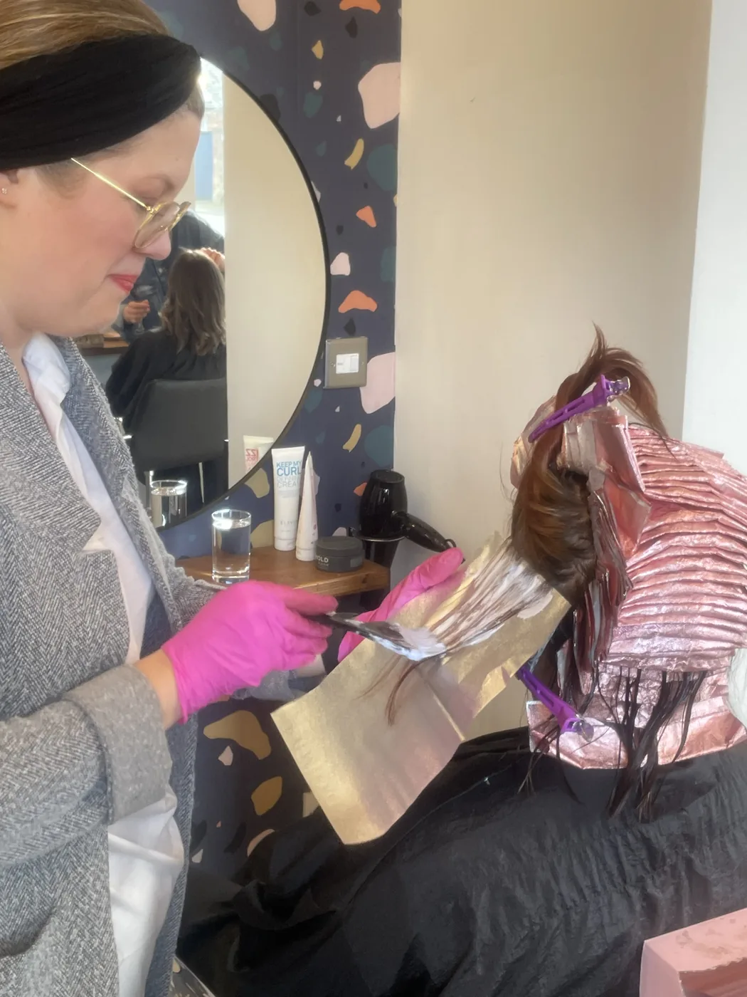 Anna Berglund applying color in foils to begin the color correction.